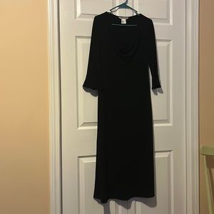 Solid black mid length sleeve shin length dress with lace inset